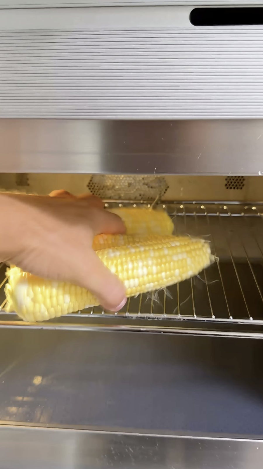 The microwave display shows a two-minute cooking time.